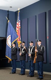 Army ROTC Cadets Chris DeMasi, Steven Milazzo, Joseph Stacey and Alexander Polk present the colors during the Veterans Day Ceremony in the Bonnie Auditorium