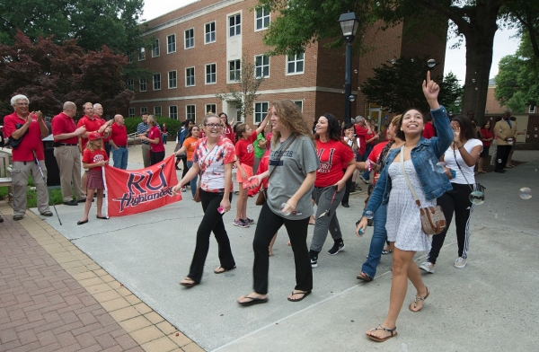 Photo of students walking to RU Freshman Convocation
