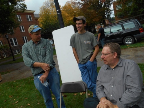 Appalachian Studies faculty member Ricky Cox (left), freshman Rob Slusser (center) of Clifton Forge and Scott Freeman share stories at the 29th annual Appalachian Folks Arts Festival during Homecoming 2014
