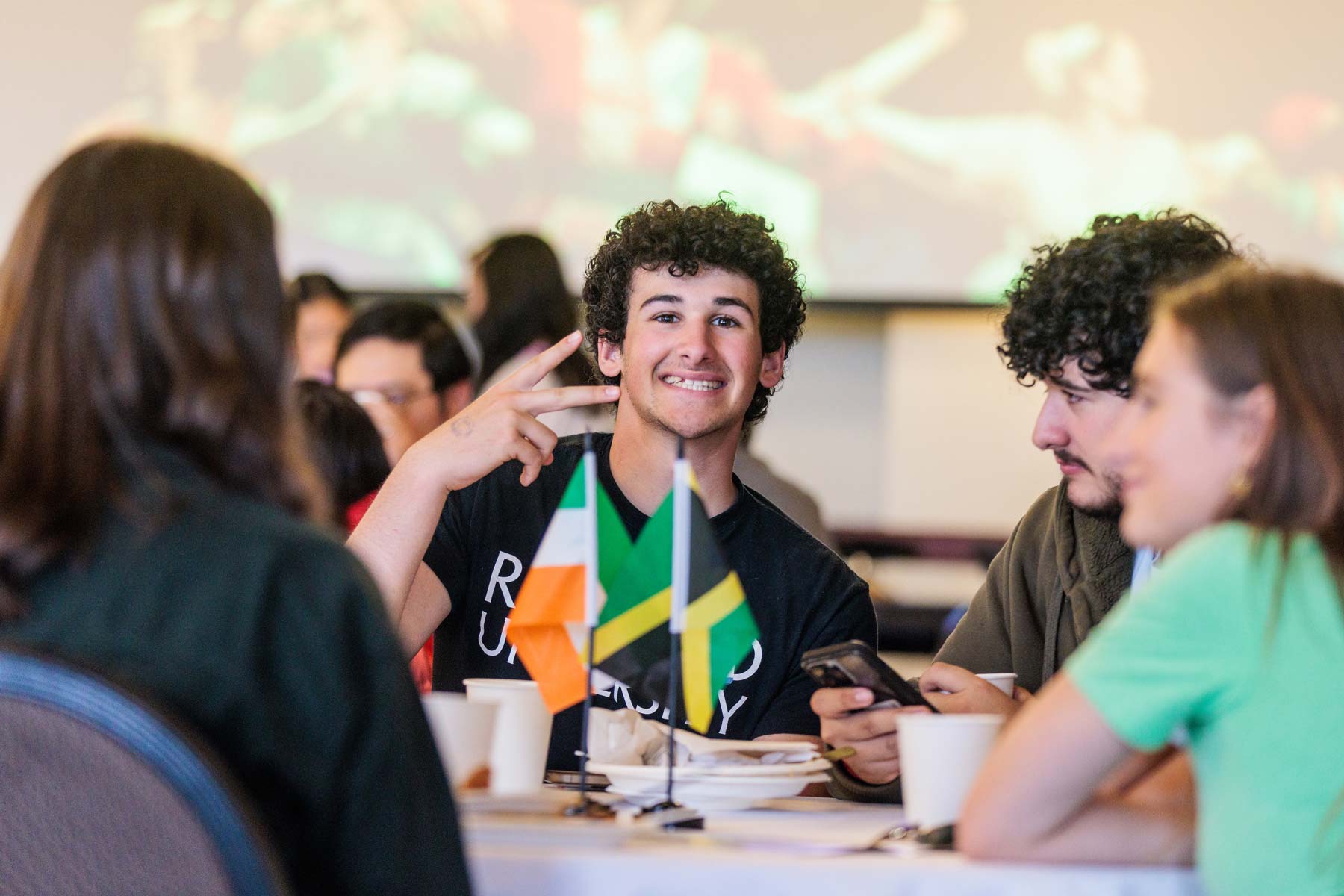 Inernational student smiling during a campus event.