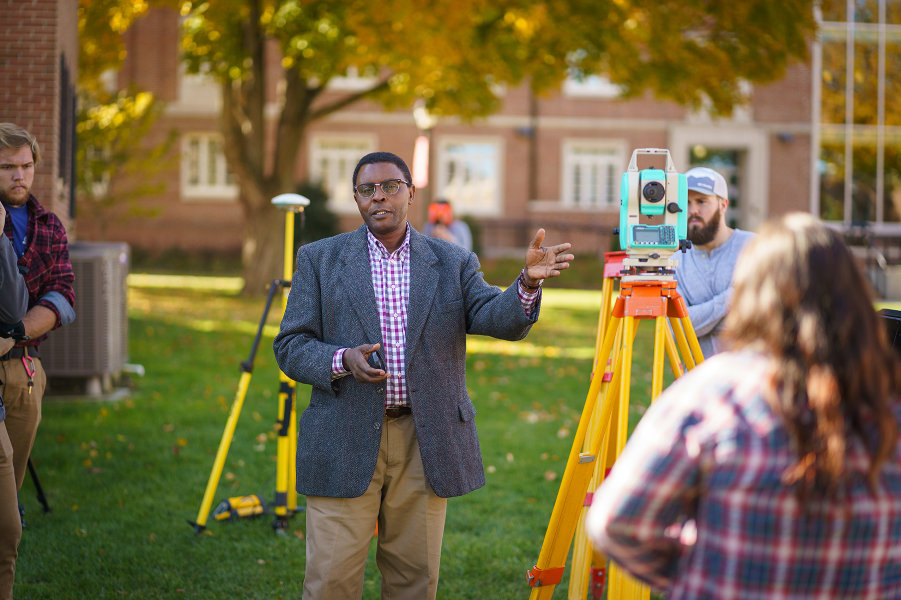 students and professor fieldwork