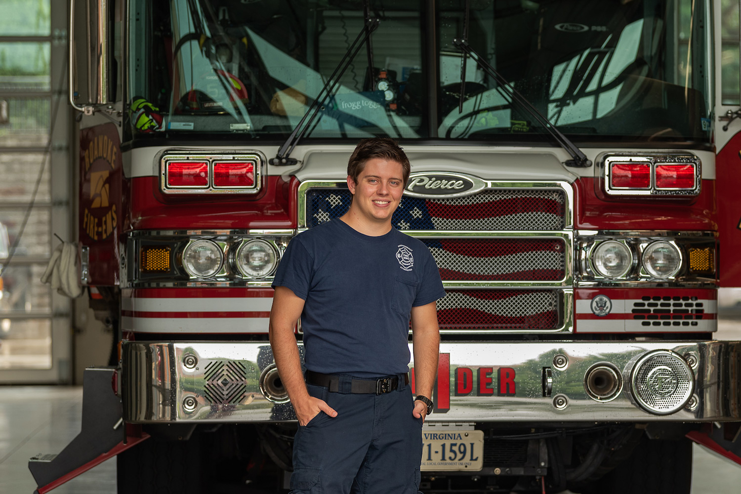 man in front of fire truck