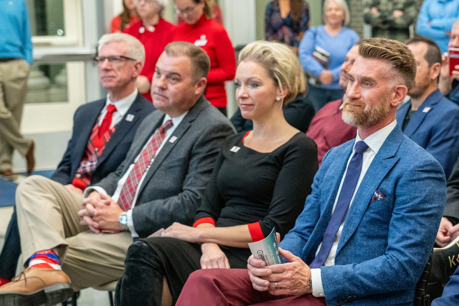 Marty Smith, Nicole Robinson, Drew Robinson and President Bret Danilowicz listen to speakers at the CHBS awards ceremony