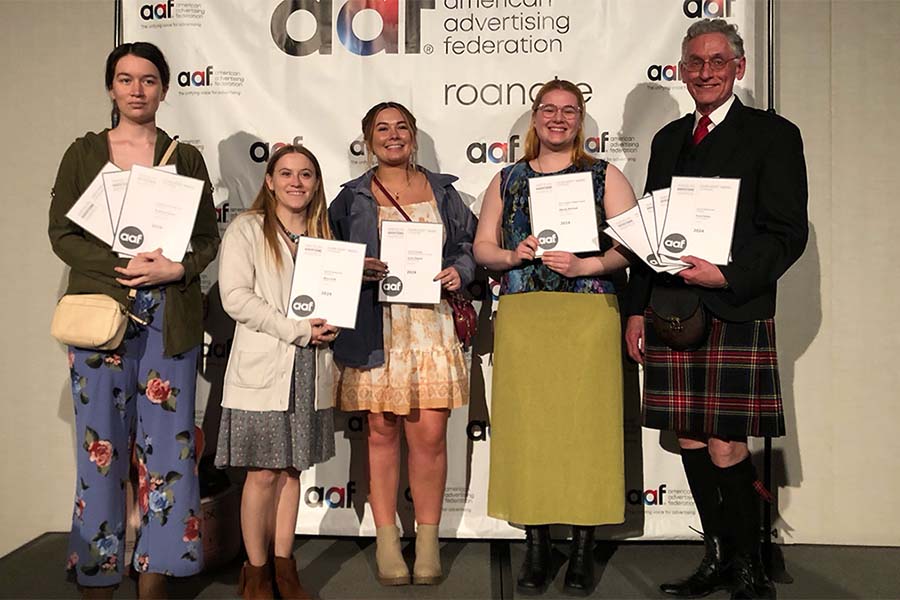 Seven of Radford’s graphic design majors racked up a total of 11 wins in the student categories of the Western Virginia Advertising Awards, or “the Addys,” held at the Hotel Roanoke and Conference Center on March 2. Pictured (L to R): Brittiany Rorrer, Ahna Huff, Jenna Repass, Wendy Marshall and Radford University Professor of Graphic Design Ken Smith.