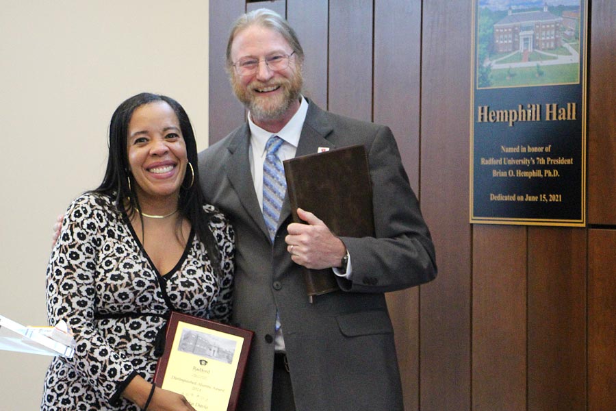 The Honorable Devika E. Davis with Interim Dean of the College of Humanities and Behavioral Sciences, Jeff Aspelmeier, receiving the 2024 Outstanding Alumni Award. 