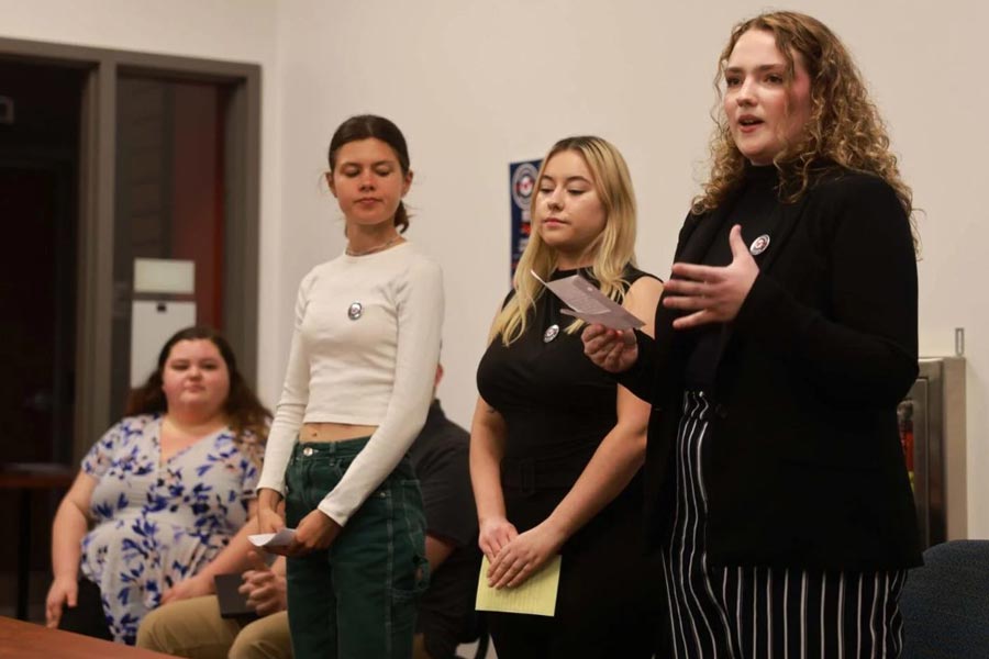 A group of students participate in an election day discussion.