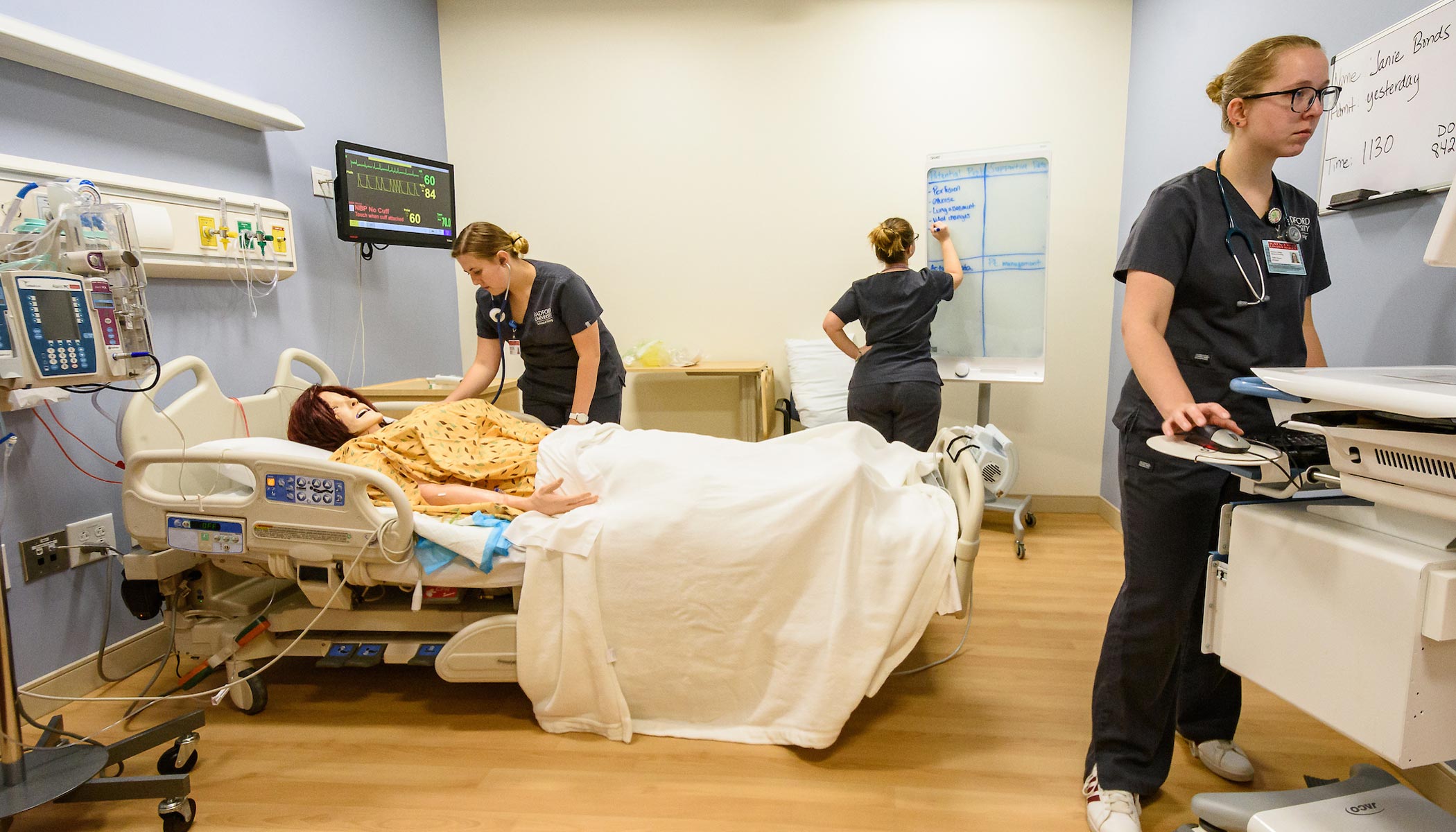 students working in clinical simulation center