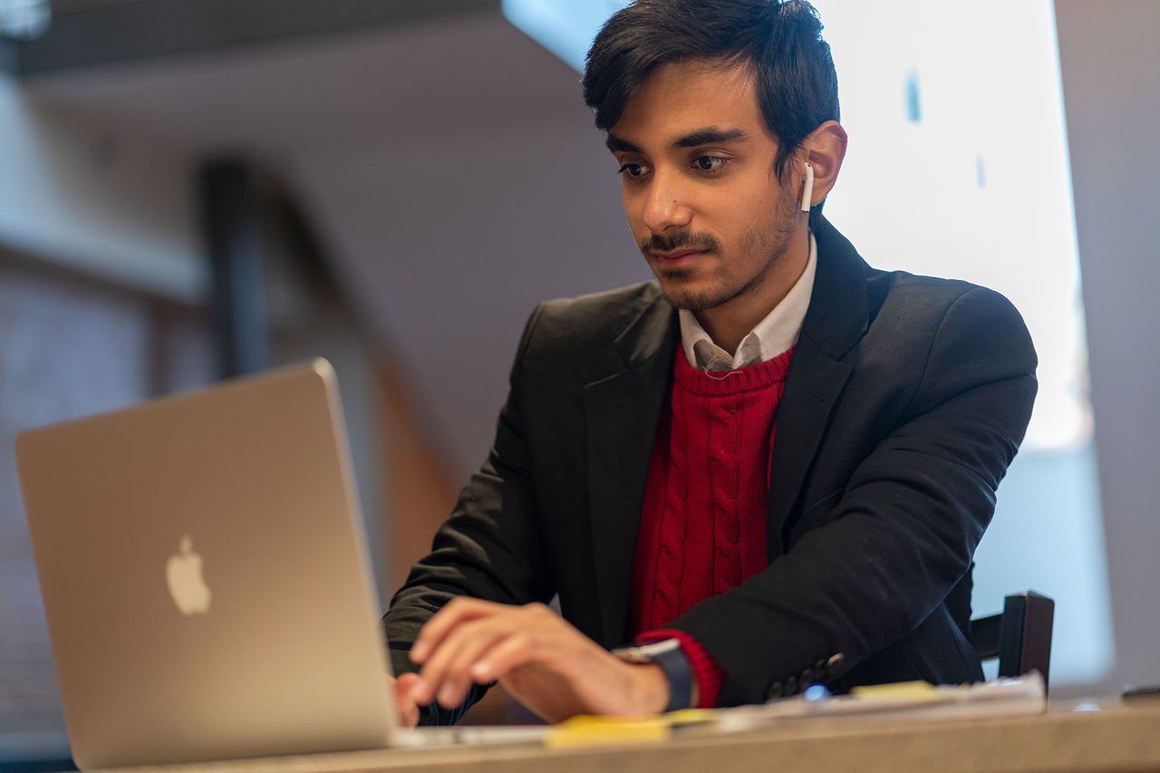 student working on laptop