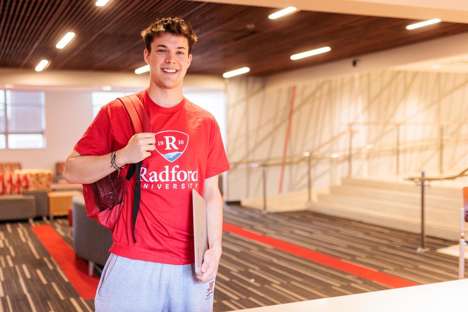 student standing in student center