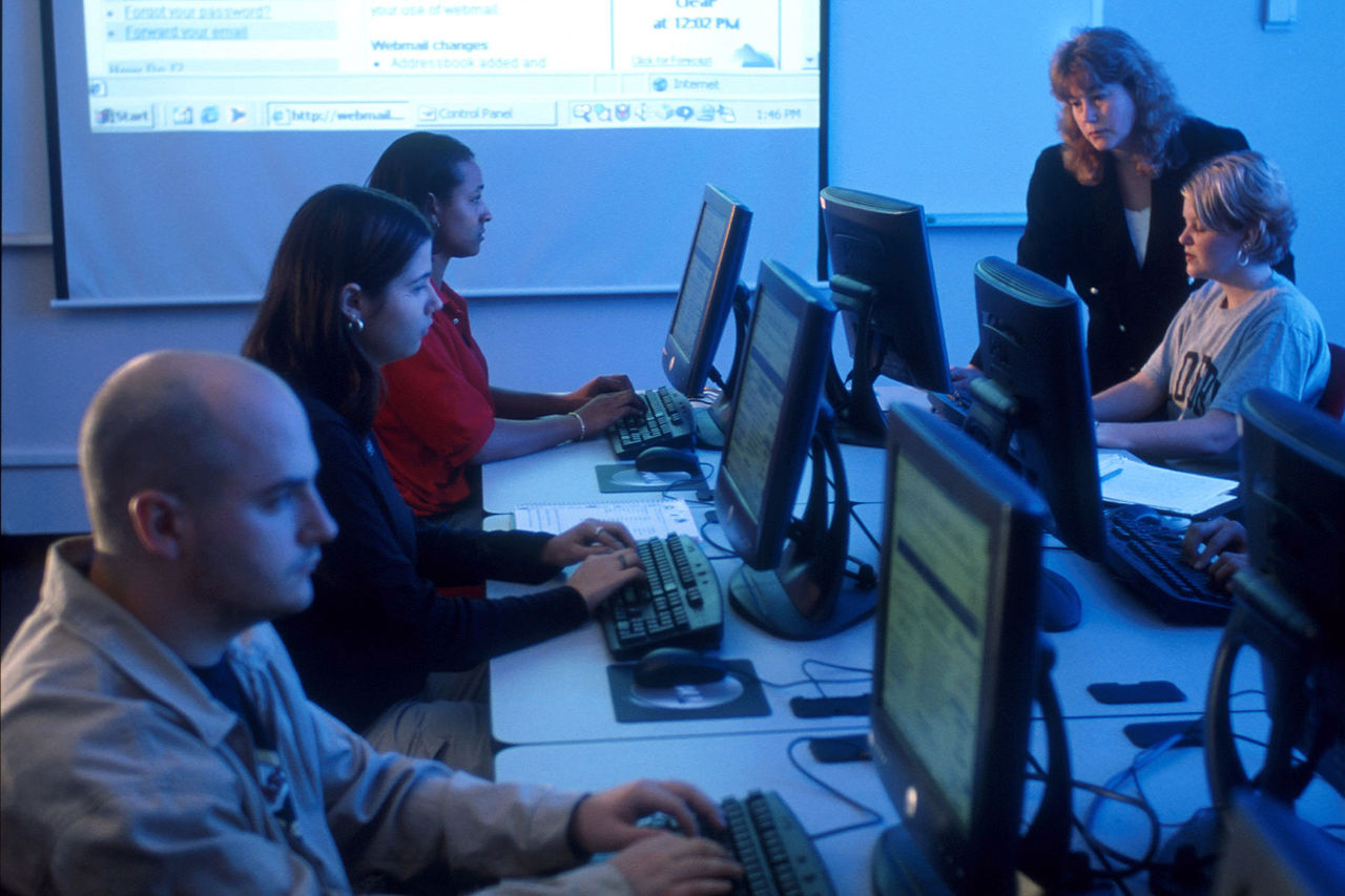 students at computers in a classroom