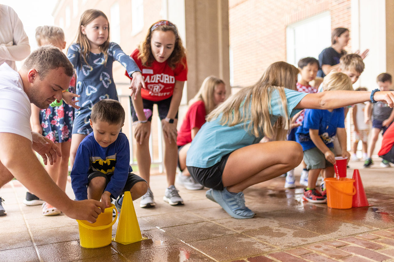 Radford students leading a children