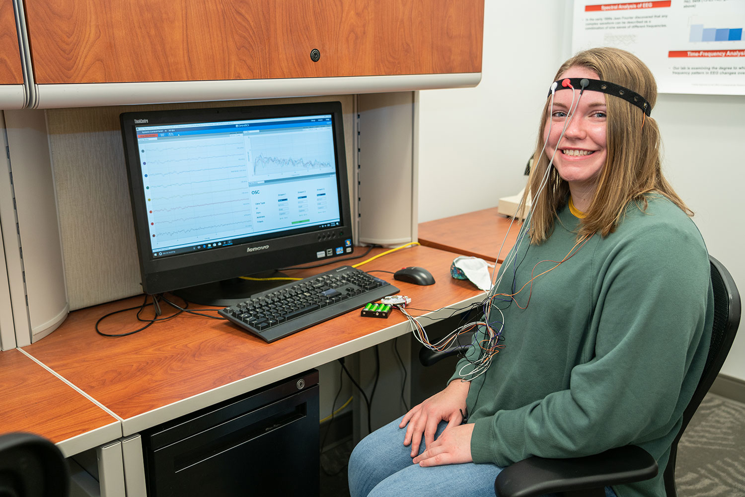 student in front of a desktop