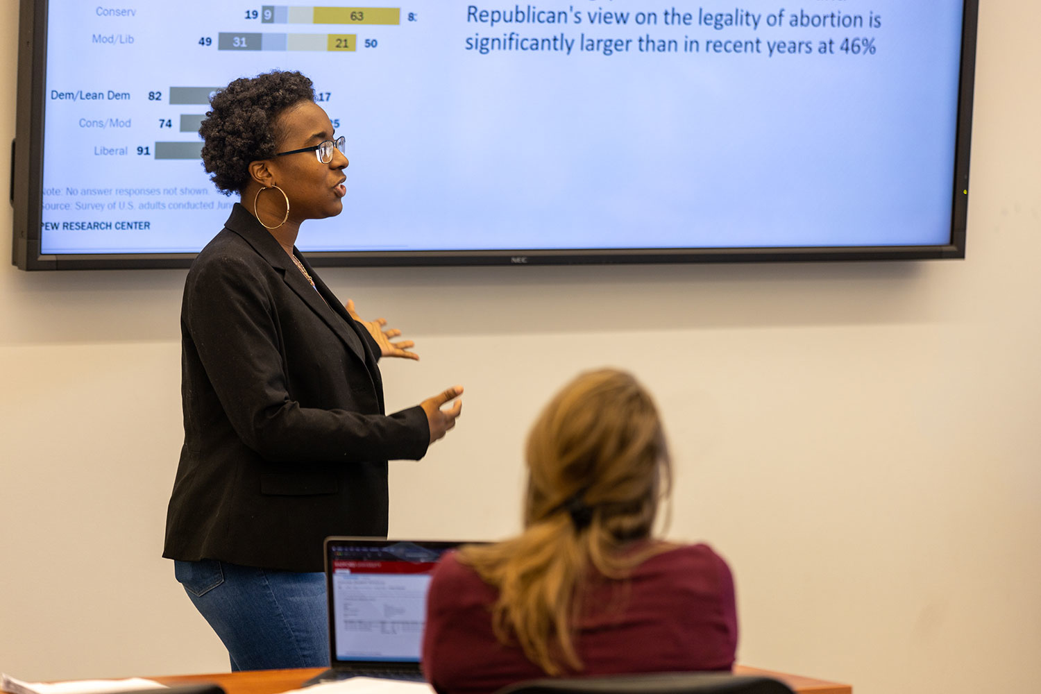 student presenting in classroom