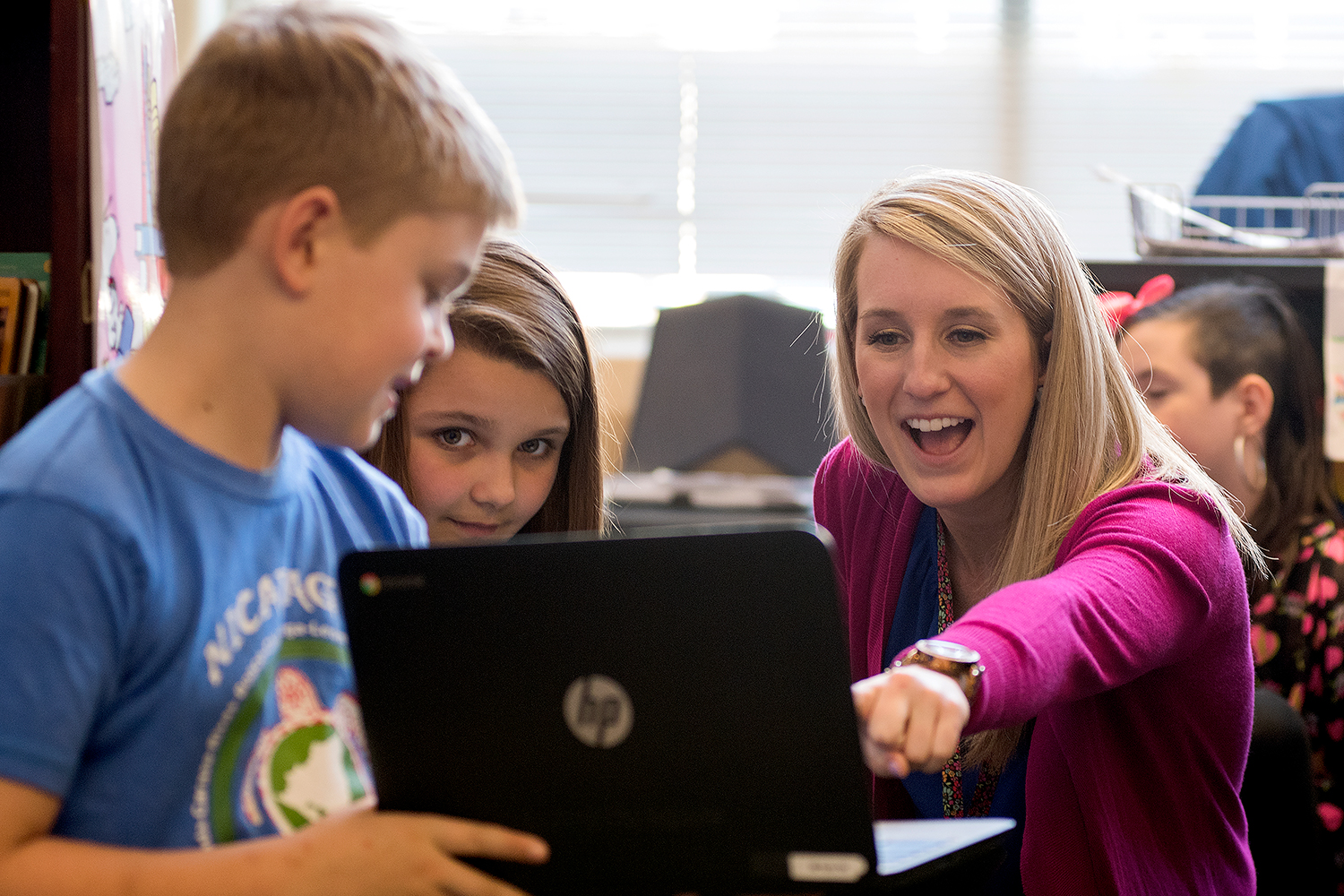 Teacher interacting with students