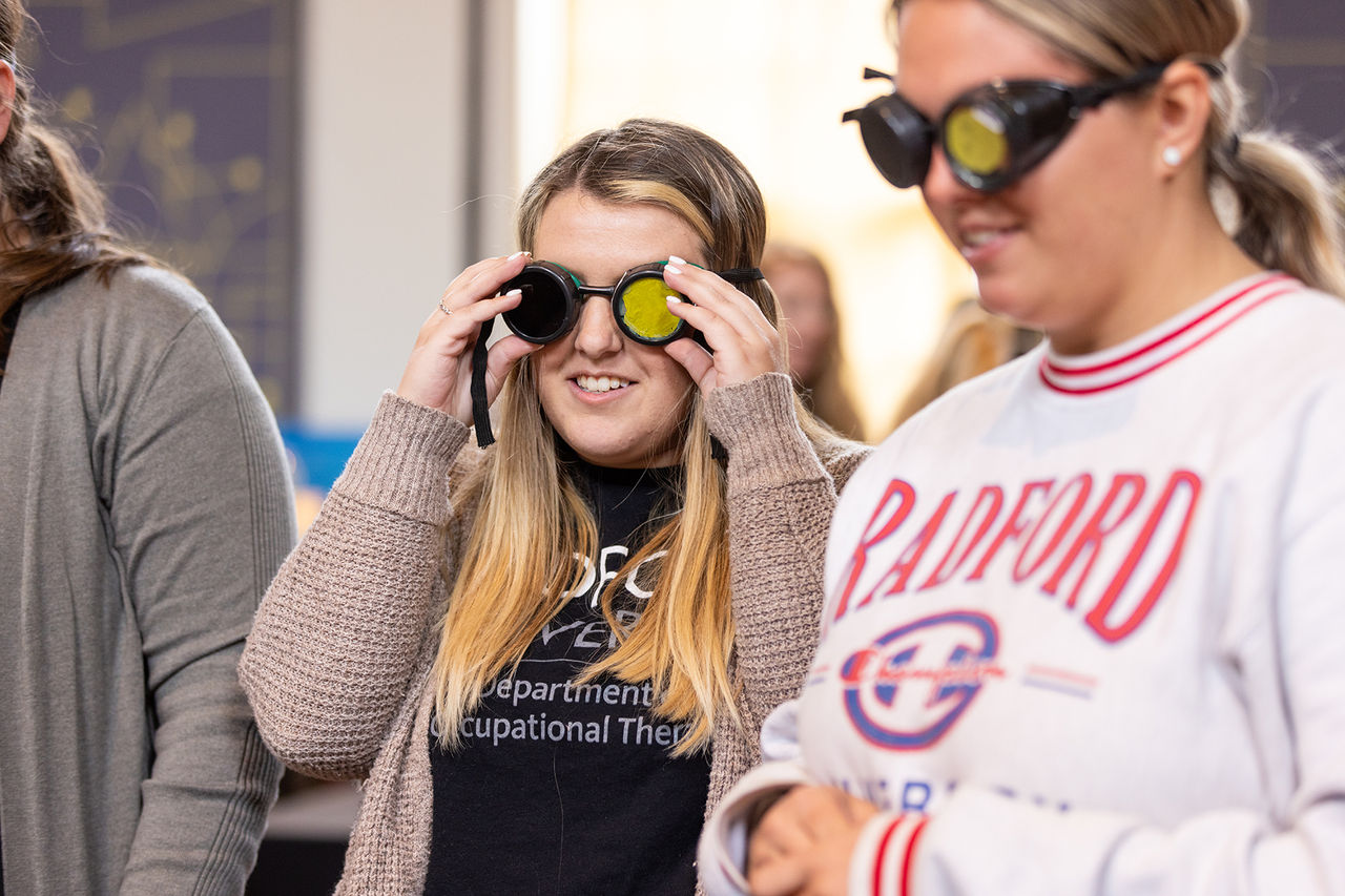 two students with special goggles on