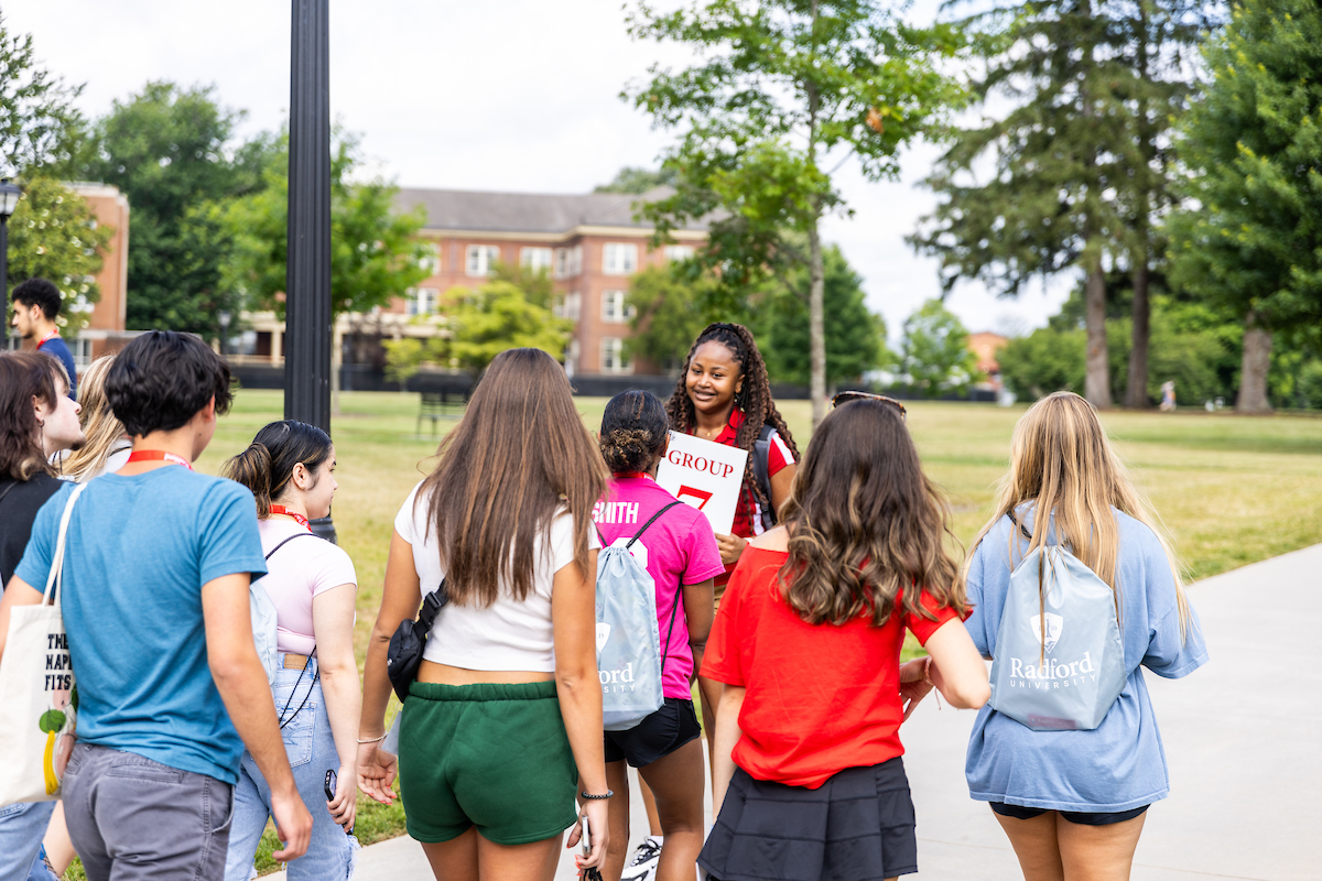 Transfer Quest leader on campus.