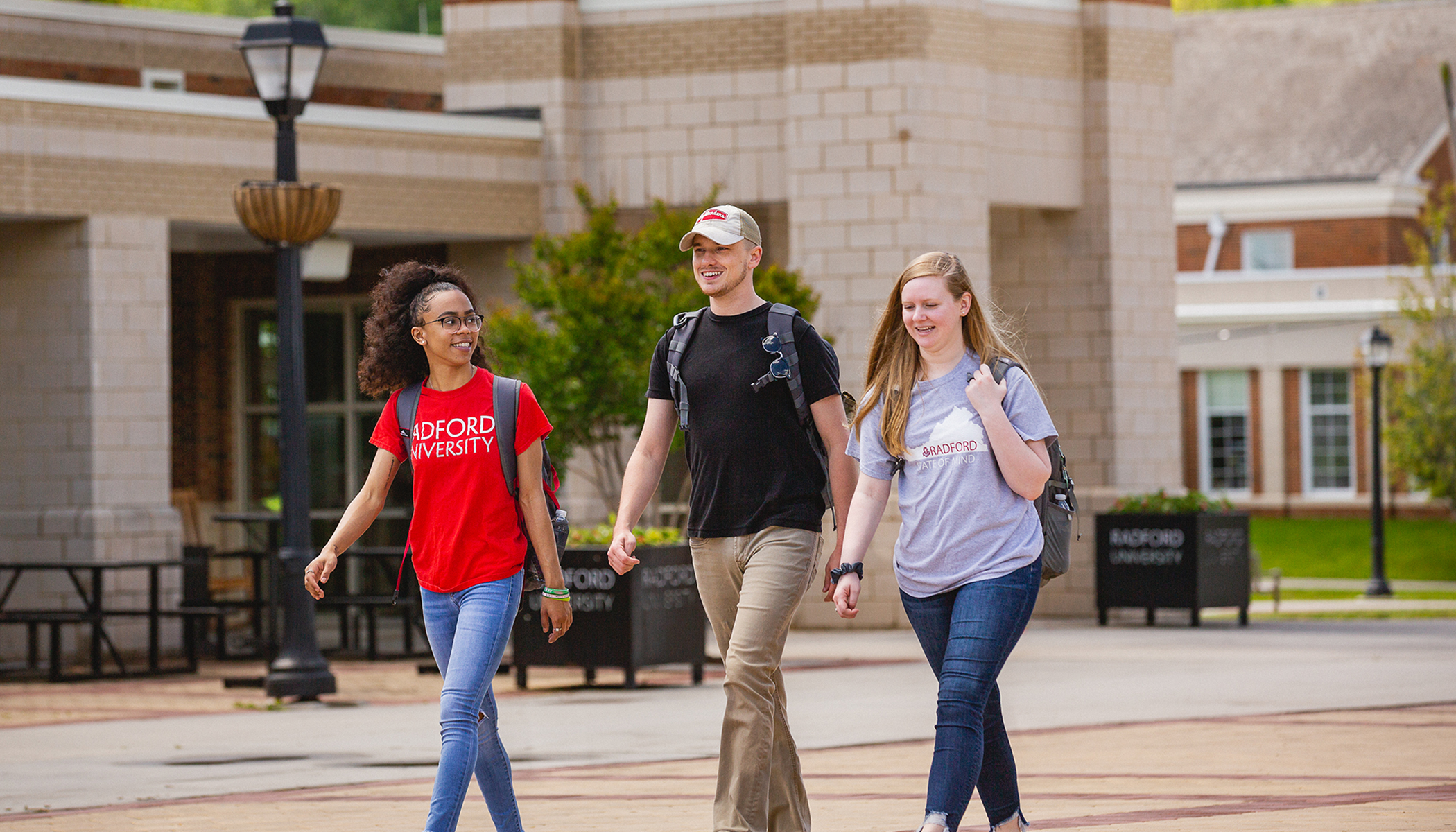Students walking together across the Bonnie Plaza.