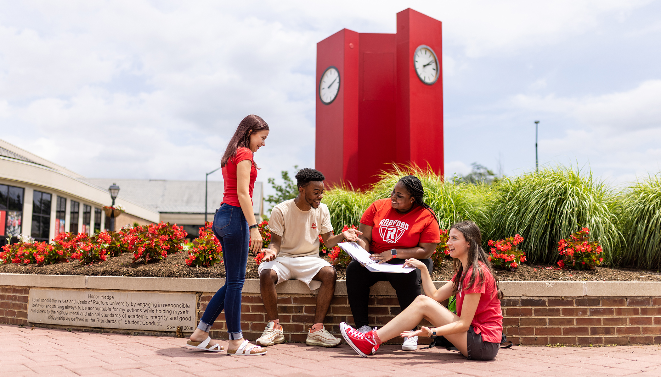 students sitting at the Heth Clocks together