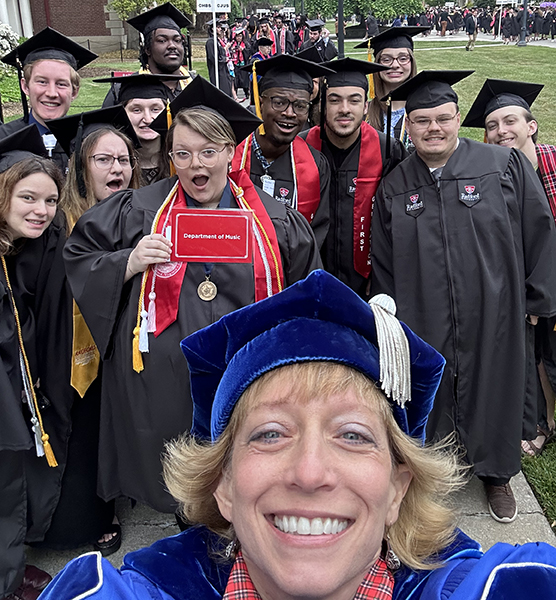 Professor McDonel with graduates